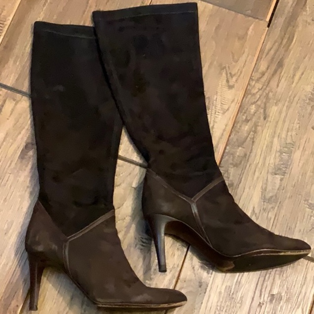 Cole Haan brown heeled boots.